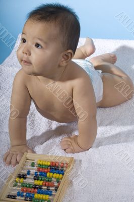 Sweet baby with a ball machine