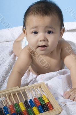 Sweet baby with a ball machine