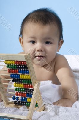 Sweet baby with a ball machine