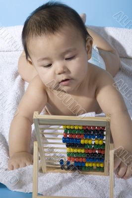 Sweet baby with a ball machine