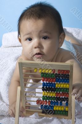 Sweet baby with a ball machine