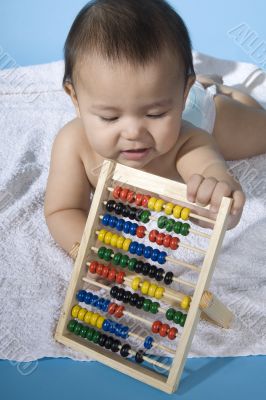 Sweet baby with a ball machine