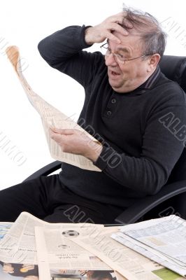 Senior read newspaper