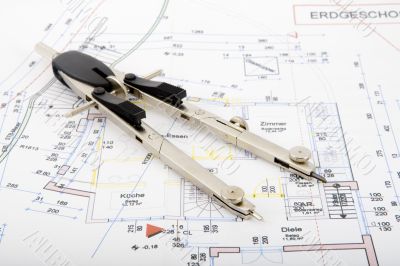 Building plan with pair of compasses
