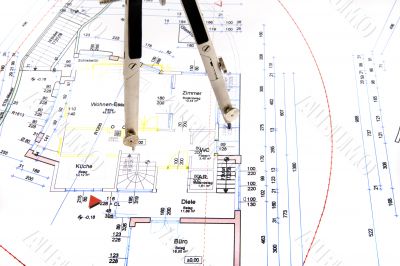 Building plan with pair of compasses