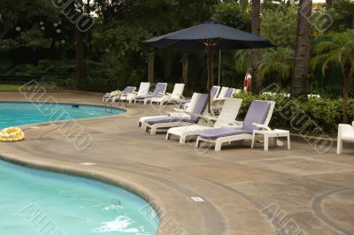 Poolside deckchairs