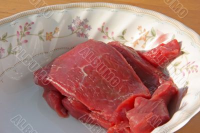 Raw beef slices