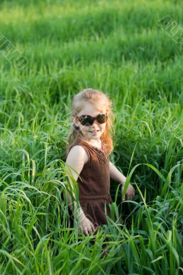 The child in a grass