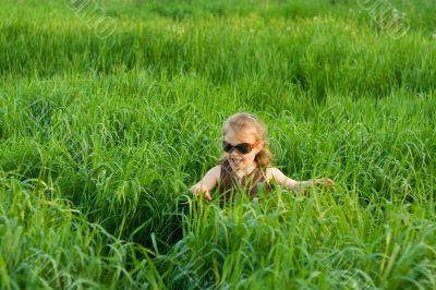 The child in a grass