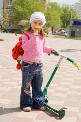 The child with a skateboard