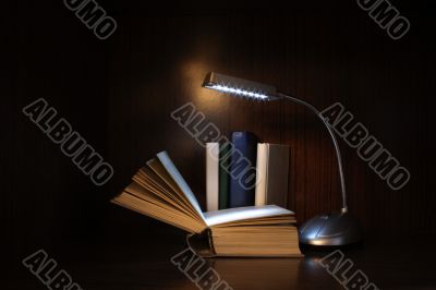 Books and lamp
