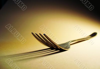 fork and long shadow