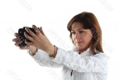 young woman with old camera