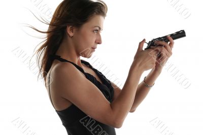 young woman with revolver isolated on white background