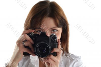 young woman with old camera isolated on white background