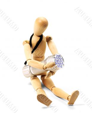 wood mannequin and flashlight