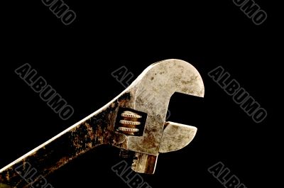 monkey wrench on black
