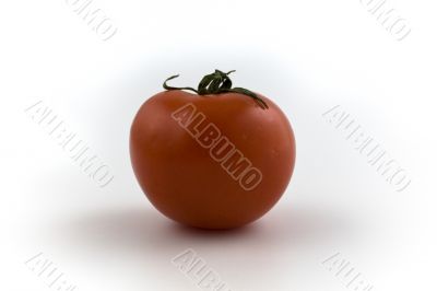 one red fresh tomato