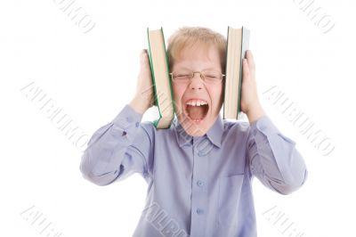 Boy squeeze head by two books and scream
