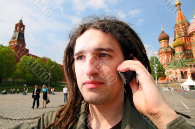 Young man with dreadlock hair.