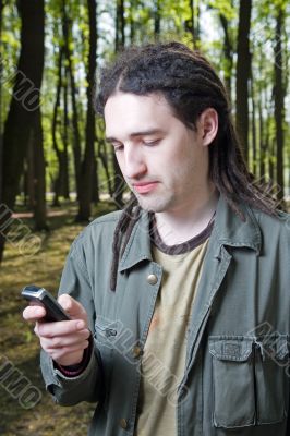 Young man with dreadlock hair.