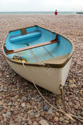 Boat on a pebble beach