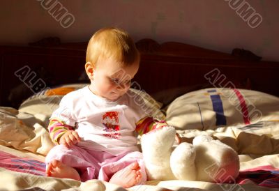  Little girl  play with bear