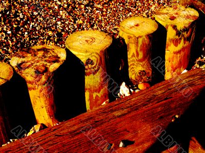 dark abstract of beach groynes