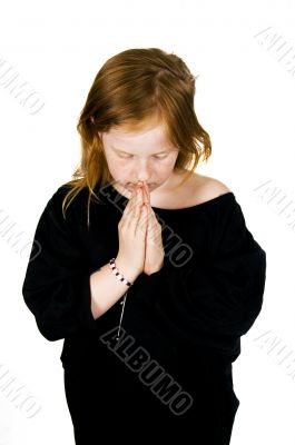 little girl praying