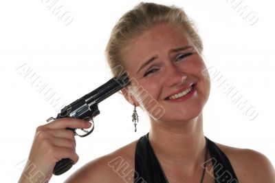 young blond woman in black dress with revolver isolated on white background