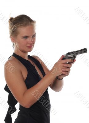 young blond woman in black dress with revolver isolated on white background