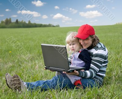 mother and daughter with laptop