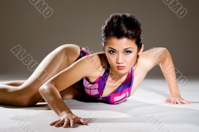 sexy woman crawling on the floor