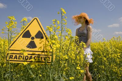 rape field with sign radio-active