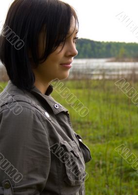 pretty brunette near lake