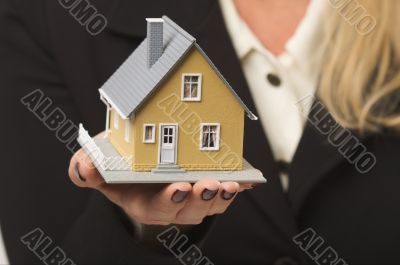 House in Female Hand