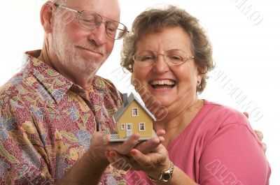 Happy Senior Couple & Home
