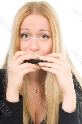 beautiful blond woman with a harmonica