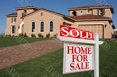 Sold Home For Sale Sign & New House