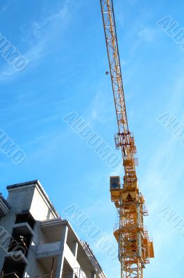 New building under construction with crane