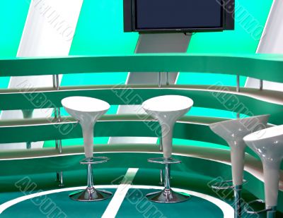 furniture for a bar in green tones