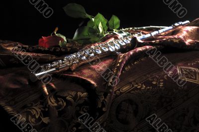 Flute and rose