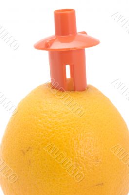 juicer with orange close up