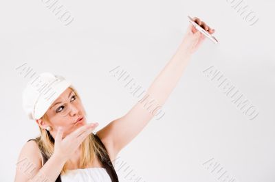 Blond woman is sending love
