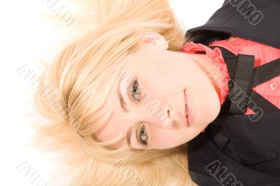 Young blond woman laying on the white floor