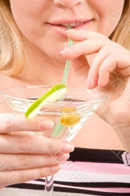 Girl drinking Martini cocktail