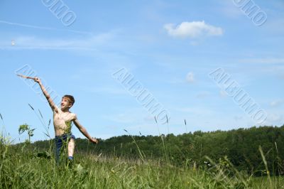 Boy playing at badminton