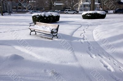 Empty Snowy Bench