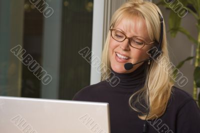 Attractive Businesswoman with Phone Headset