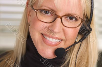 Attractive Businesswoman with Phone Headset
